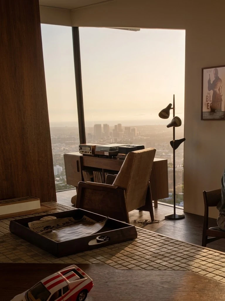 A stylish mid-century modern chair placed at the Harry Bosch house in the Hollywood Hills, capturing the relaxed indoor-outdoor California living aesthetic