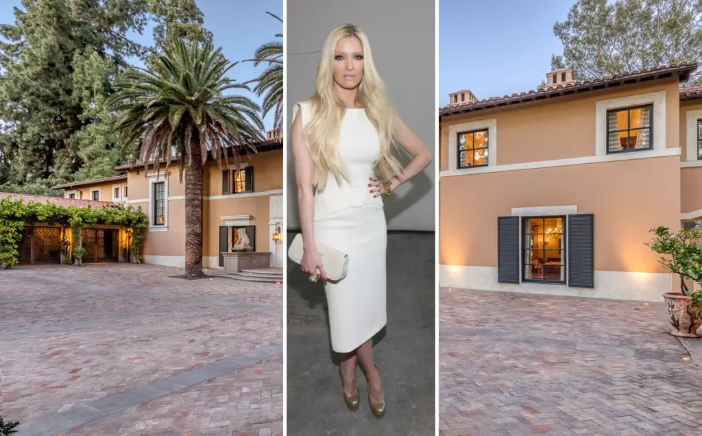 Erika Jayne standing in her newly renovated 1920s Los Angeles home, Villa Jayne, designed by Martyn Lawrence Bullard.